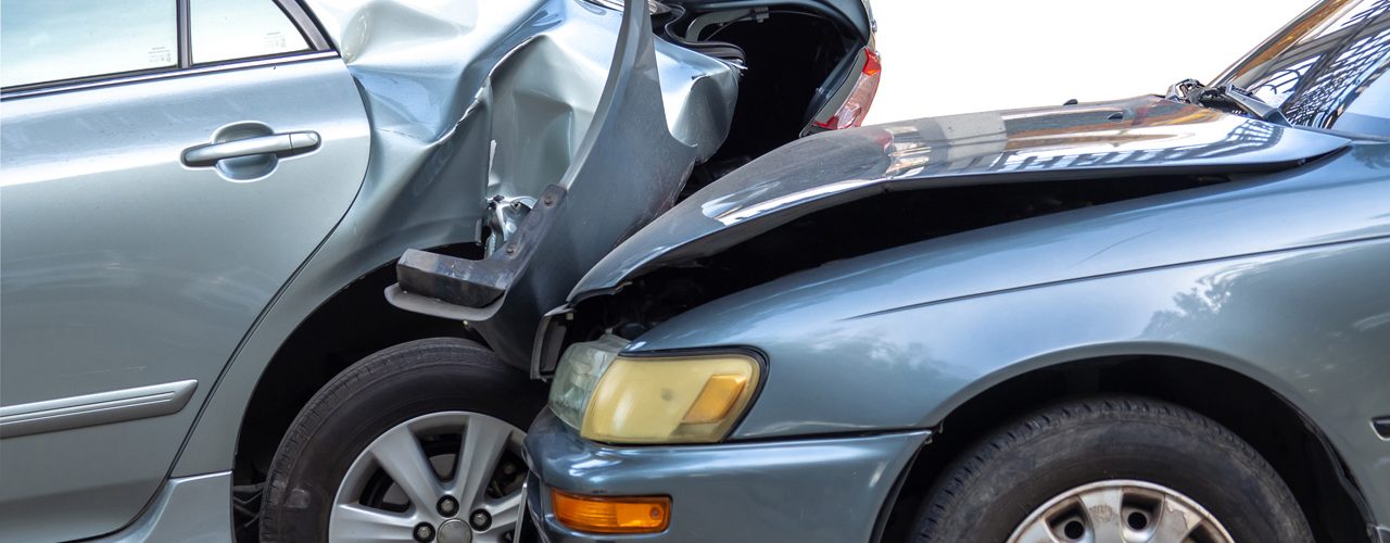 Two Compact Cars Needing Accident Recovery